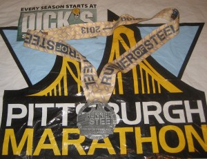From the Goat: I am SO jealous.  Runner of Steel??? Best medal ever!
